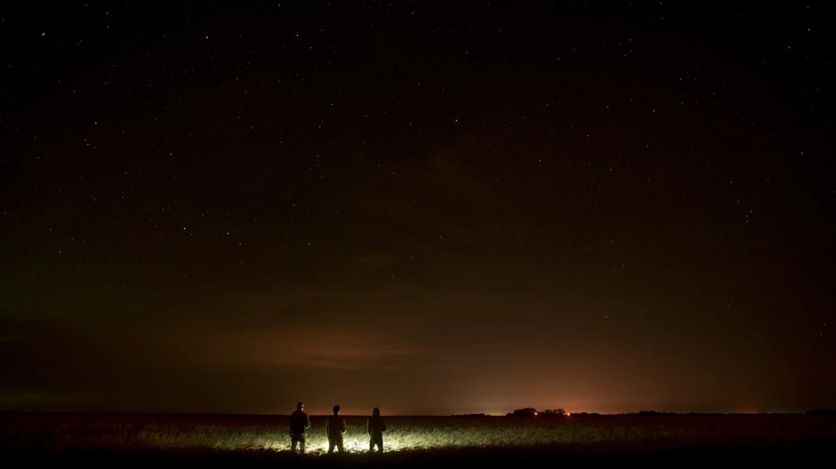 Looking up at the stars in the filthy canal